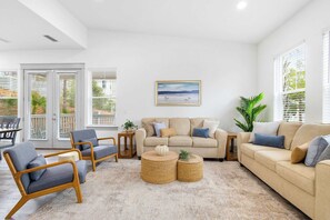 Your Home Away from Home! With plush seating, warm décor, and plenty of space to unwind, this living room is designed for ultimate comfort! 