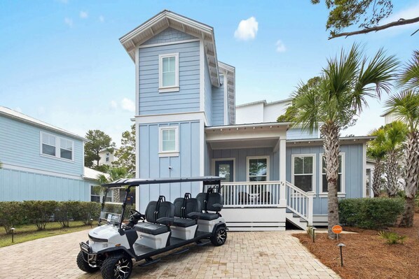  Explore in Style! Your dream vacation starts here—a spacious and modern beach house with a golf cart for cruising to the shore! Book your escape today! 