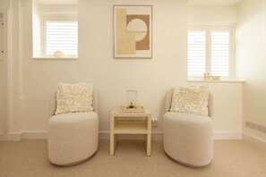 Bedroom with 2 chairs