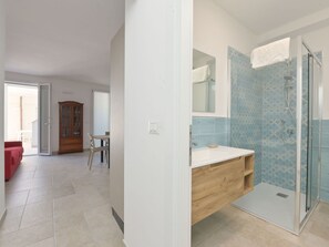 Flooring, Floor, Interior Design, Ceiling, Room, Plumbing Fixture, Tile, Door, Bathroom, Apartment