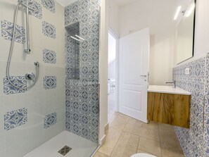 Flooring, Floor, Bathroom, Plumbing Fixture, Interior Design, Tile, Plumbing, Room, Mosaic, Tap