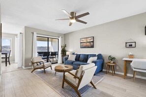 Curl up in the breezy living room & stream your favorites on the smart TV