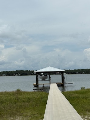 Located on the Little Lagoon in Gulf Shores with a boat lift and private pier