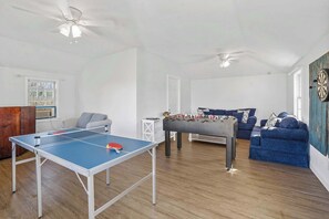 Unleash the fun in our vibrant game room
