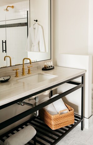 Sleek and modern bathroom design, where elegant finishes and warm lighting create a spa-like retreat.