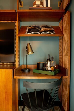 Charming workspace with vintage flair, blending mid-century design with modern convenience for a stylish touch.