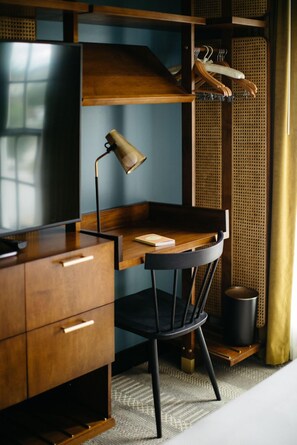 Chic and functional workspace, where rich wood tones and warm lighting inspire creativity and focus.