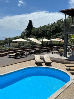 Communal swimming pool and sea view
