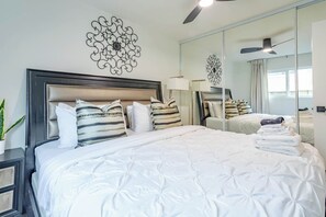 Recharge in this peaceful second bedroom, complete with a cozy bed.