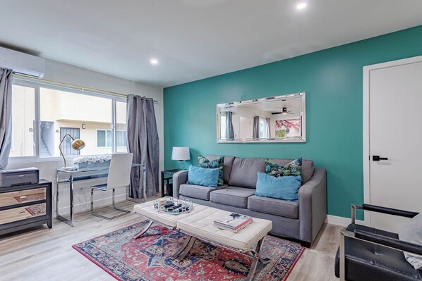 Cozy and inviting living room with plenty of natural light.