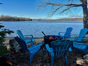 Sit around the firepit as you enjoy a drink and enjoy the lake view and nature
