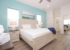 Main Floor - Master bedroom with king bed & en-suite full bathroom.