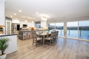 Breathtaking views from the main floor open concept kitchen-dining-living room.