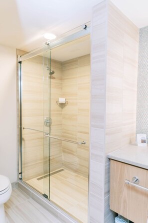 A sleek, spa-like escape where every detail is designed for relaxation and rejuvenation.