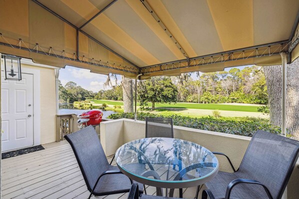 Take in the fresh air on the patio with golf course view
