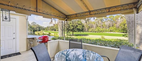 Take in the fresh air on the patio with golf course view