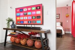 Catch the game on our 50” 4K UDH Smart TV - fully equipped with 4K Apple TV and Dolby Vision & Dolby Atmos sound bar 