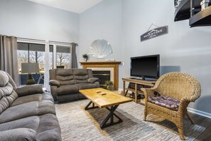 Curl up in the inviting living room & enjoy a movie night at home