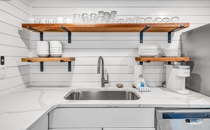 Ample open shelf storage puts everything at your fingertips.