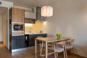 Unit with fully equipped kitchen