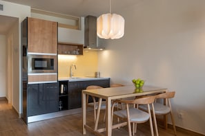 Unit with fully equipped kitchen