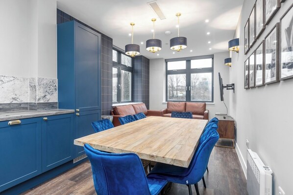 Open plan kitchen and living room with TV area