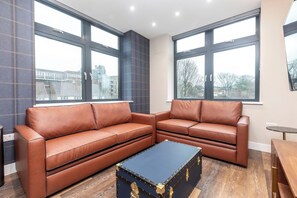 Open plan kitchen and living room with TV area