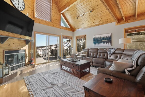 Large windows offering stunning views of the Black Hills.