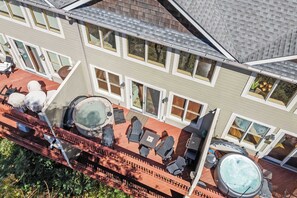 A Bird’s-Eye View of Fun & Relaxation – Our multiple decks offer endless outdoor enjoyment, featuring a hot tub, fire pit, BBQ grill, and cozy seating with stunning views.