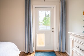 Primary King Bedroom Suite has Doggie Door