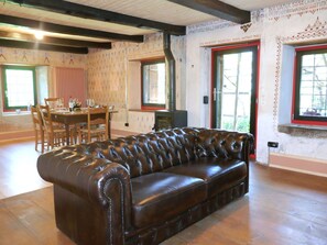 Furniture, Interior Design, Flooring, Wood, Floor, Couch, Table, Living Room, Room, Wood Flooring