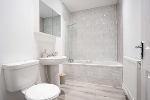 Full Bathroom:
- Sink
- Toilet
- Electric Shower-over-Bath
