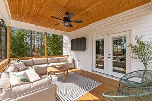 Large outdoor entertainment area with a 50" TV so you won't miss any action.