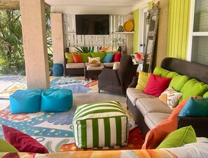 outdoor patio with TV -shared space