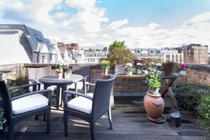 Enjoy charming London views on the private balcony.
