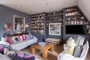 Relax in the bright and cozy living room.