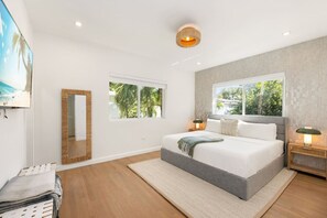 Elegant bedrooms featuring plush, hotel-grade bedding for a truly restful escape.