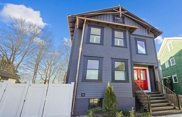 Two Unit House, primary entrance in front with separate interior entrance Unit 1