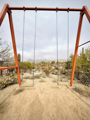 Custom built adult sized swing with desert and mountain views
