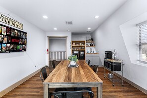 Gathering area upstairs with ice maker and coffee cup maker