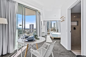 Dining area is right next to the sleeping area and the balcony