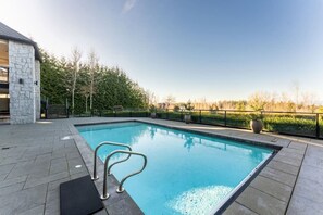 Dive into relaxation with a pristine pool and serene views of lush greenery. 🏊‍♂️🌿 Perfect for unwinding and enjoying nature's beauty. #PoolsideRelaxation #GreeneryViews #LuxuryLiving #OutdoorOasis