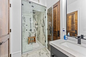 Indulge in a luxurious walk-in shower, perfect after a refreshing dip in the pool and spa. 🚿✨ Featuring a rain shower and handheld for the ultimate comfort and relaxation. #LuxuryShower #WalkInShower #RainShower #SpaExperience #RelaxInStyle