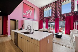 Broadway Girls unit: Open concept living room / kitchen / murphy beds