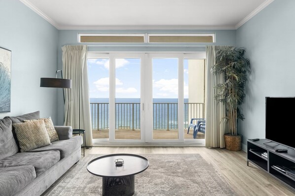 Ocean View Living Area with Balcony Access, Sleeper Sofa and Flat Screen TV