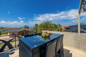 Sip cocktails and take in the spectacular sunset views from the stunning rooftop bar and lounge. With cozy seating and a covered dining area, this elevated retreat is the perfect spot to relax, unwind, and enjoy Aruba’s breathtaking skyline.