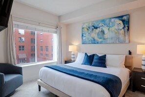 King Bedroom luxuriously designed. 55"TV. Extremely comfortable with an attached bathroom and walk in closet.