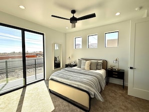 Bediroom 2 in Holiday H1 features a queen sized bed