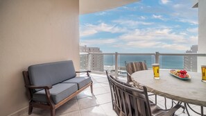 Dining table on the balcony and sofa