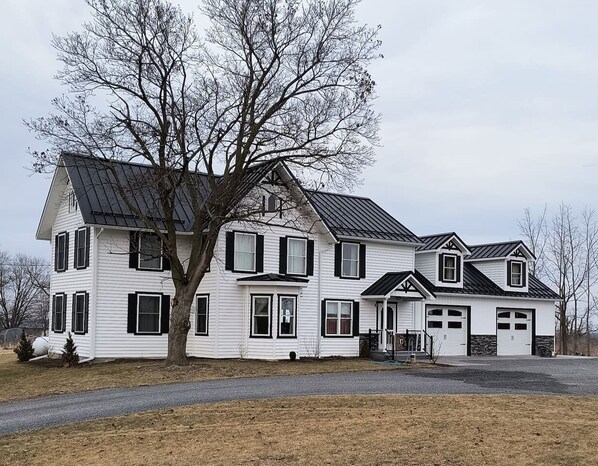 Beautifully restored farmhouse just outside of Penn Yan NY with large yard for games and family time.